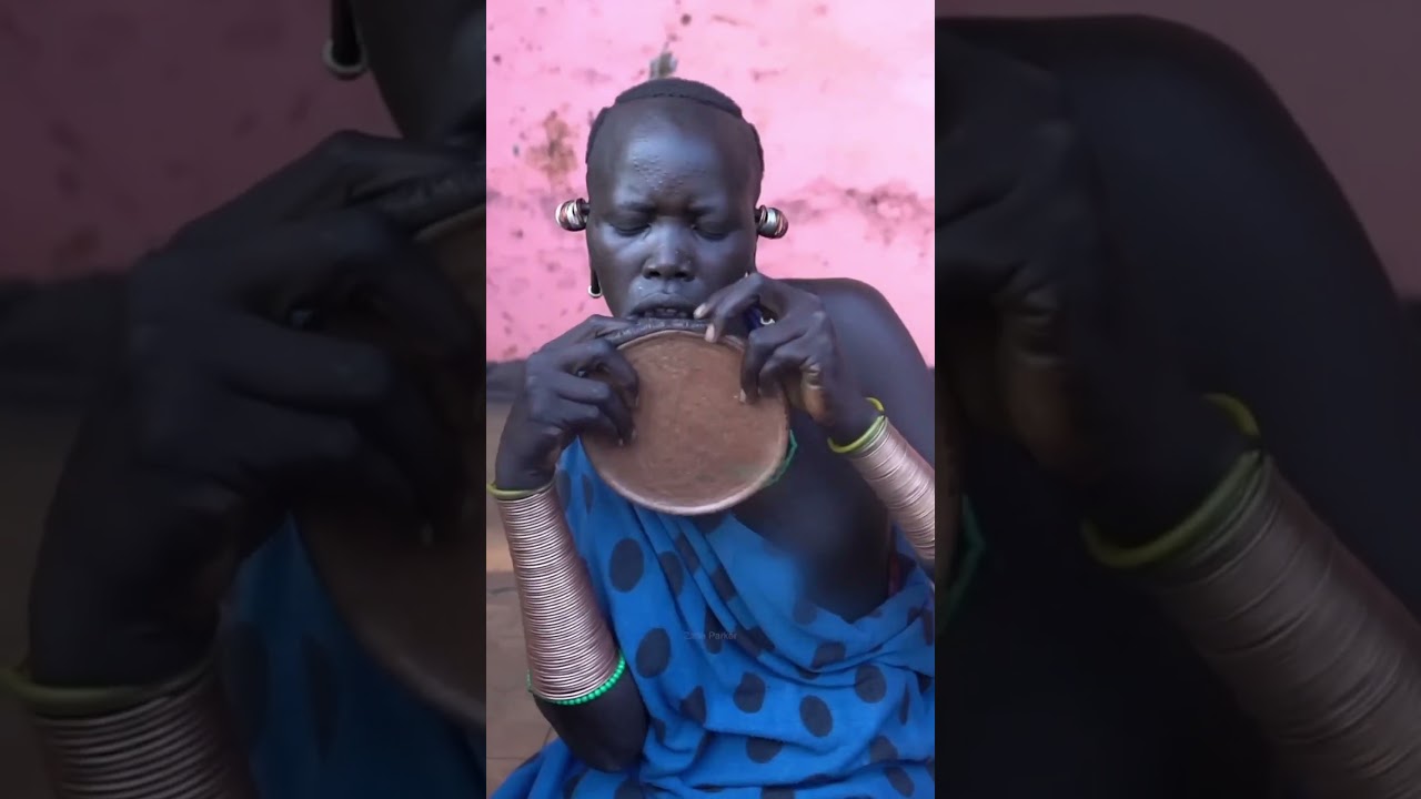 Ethiopian Surma Tribe Remove Lip Plate Before Bed