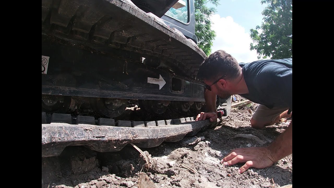 Putting on mini excavator track that came off in under 20 minutes