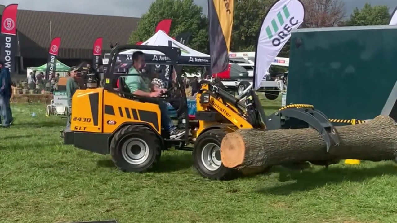 2430 SLT Compact Loader Tree Work Demo at GIE Expo