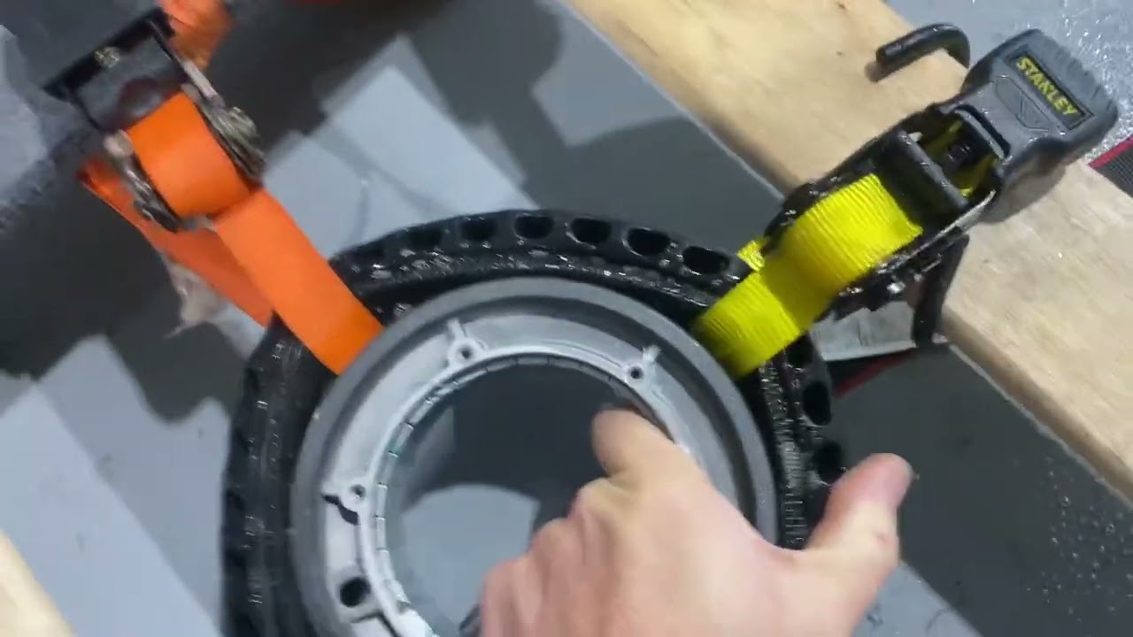 How to install solid tire on electric scooter without boiling (using just 1 hand). 