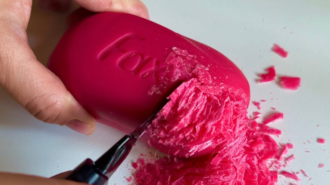 ASMR cutting pink soap on the table