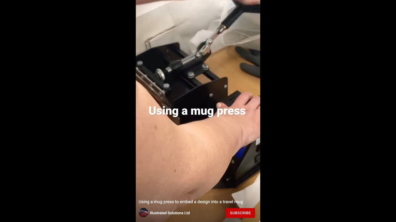 Using a mug press to embed a design into a travel mug