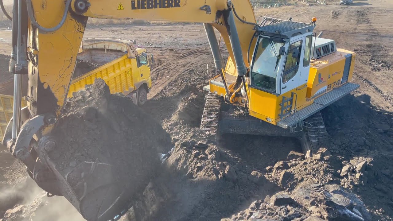 Liebherr 974 Excavator Loading Mercedes & MAN Trucks - Sotiriadis/Labrianidis Mining Works
